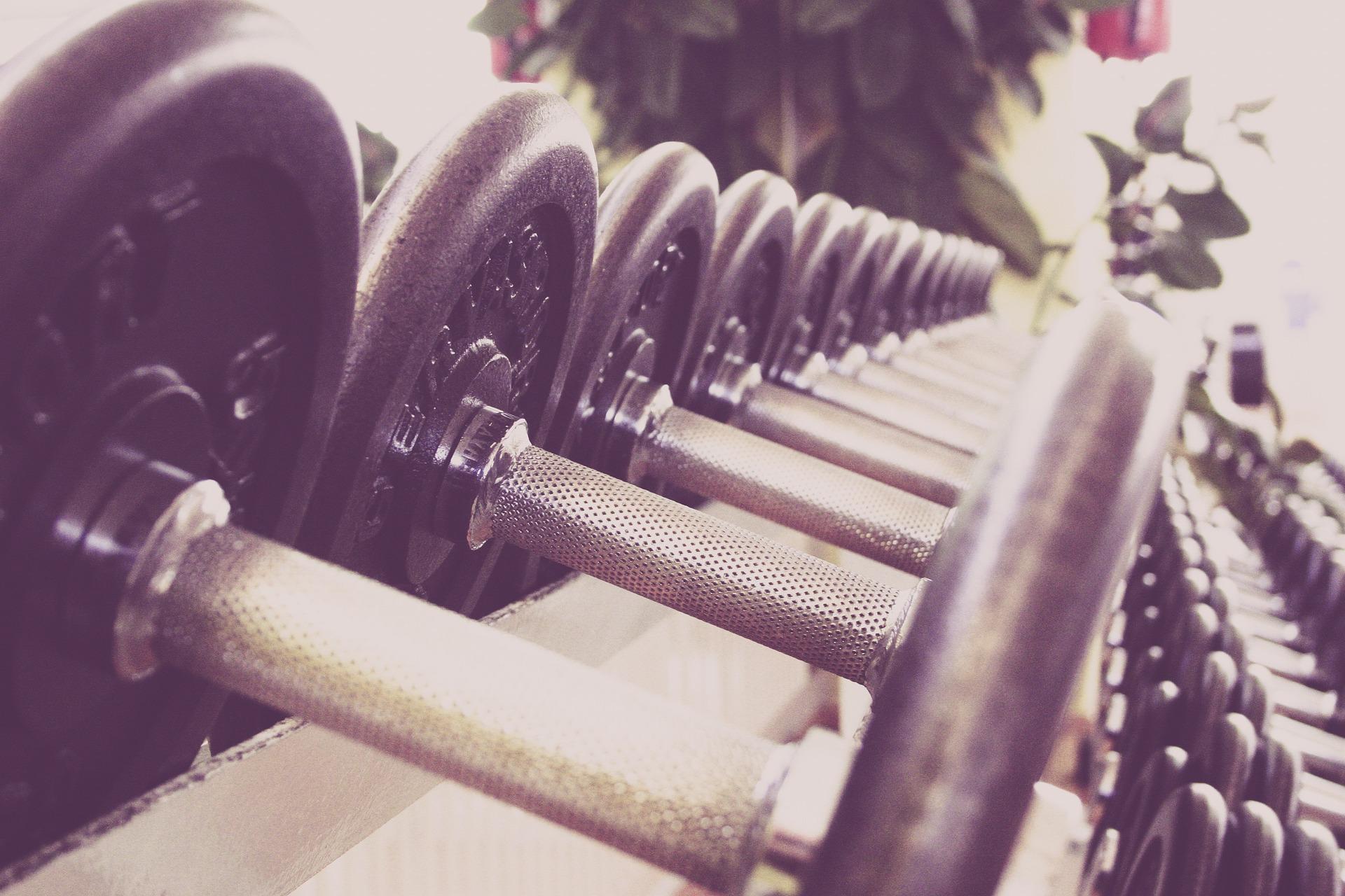 Closeup of dumbells at a gym.